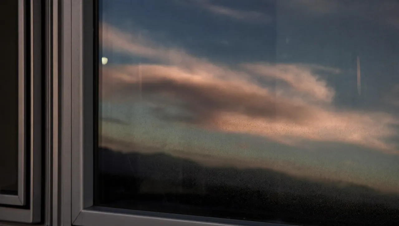Detail of low-emissivity coated glass showing a faint reflective tint