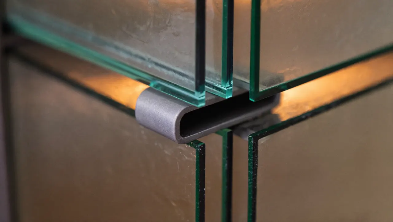 Corner detail of a sealed unit showing the warm-edge spacer bar between panes